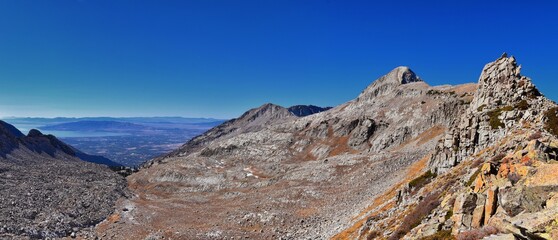 View of Pfeifferhorn peak and Lone Peak Wilderness mountain landscape from White Baldy and Pfeifferhorn trail, towards Salt Lake Valley, Wasatch Rocky mountain range, Utah, United States. 