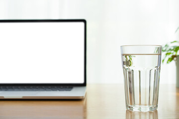 Isolated laptop computer screen with clipping path. Simply and modern home working space concept for modern working lifestyle and heath care people. 