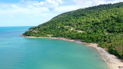 Beach and Sea and mountain Top View , Wave of Turquoise ocean water on sandy beach, High angle view sea and sand background, Aerial top view of Khanom beach, Khanom, Nakhon Si Thammarat Thailand 