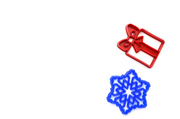 Christmas cookie molds in the shape of a gift box, snowflake, creative food concept