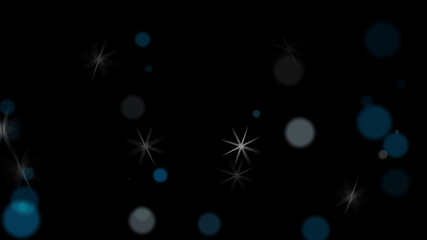 Soft focus light circles and stars particles over dark background - computer illustration graphics element Christmas celebration background
