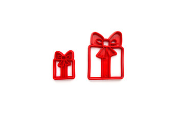 Christmas cookie molds in the shape of a gift box, creative food concept