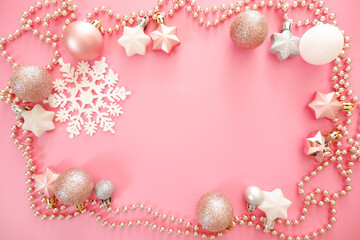 Naklejka na ściany i meble Christmas background with snowflakes and pink ornaments. winter holiday and new year concept.