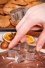 Dough and accessories for baking gingerbread and fresh baked cookies for Christmas time