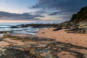 Rocky coastline sunrise seascape