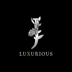 letter J flower leaves decoration for wedding, beauty care logo, personal branding identity, make up artist or any other royal brand and company. luxurious gold and silver color sample in dummy text