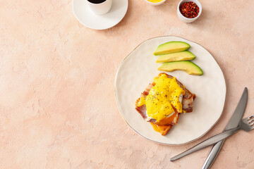 Plate with tasty egg Benedict on table