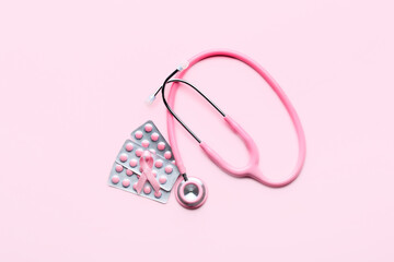 Pink ribbon, remedy and stethoscope on color background. Breast cancer awareness concept