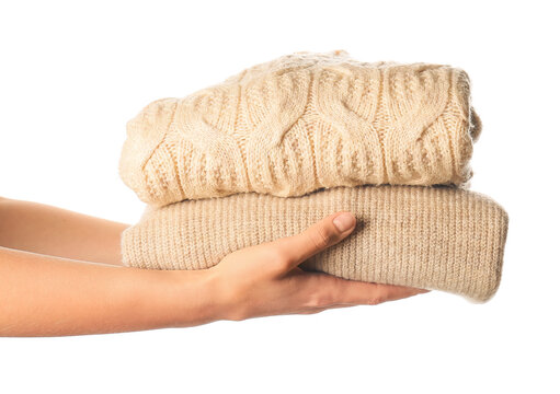 Female Hands With Warm Clothes On White Background