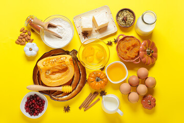 Ingredients for preparing pumpkin pie on color background