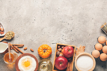 Ingredients for preparing pumpkin pie on grunge background