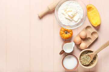 Ingredients for preparing pumpkin pie on color wooden background
