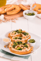 Friselle with turnip tops and hummus.