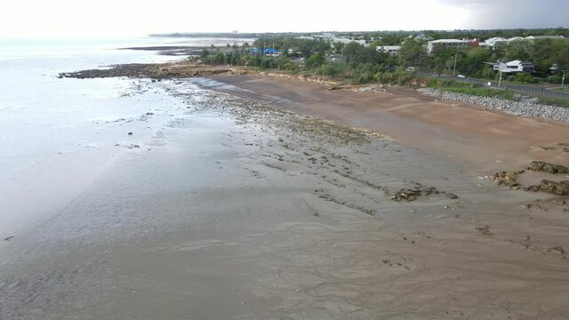 Low Drone shot of Night Cliff Beach and Rockpool in Darwin, Northern Territory