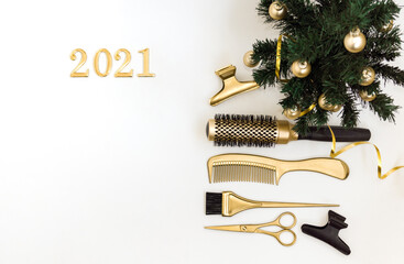Banner with hairdressing tools in gold color, numbers 2021 and a Christmas tree on a white background. Holiday template with hair salon accessories with space for text.