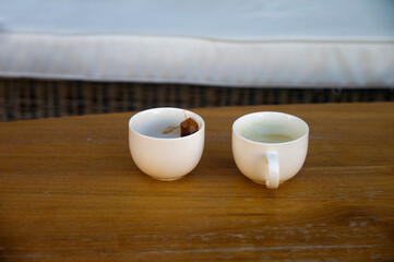 empty cups with used tea bag