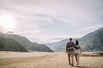 Fototapeta premium couple walking on the meadow