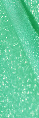Green glitter bokeh circle glow blurred and blur abstract. Glittering shimmer bright luxury . White and silver glisten twinkle for texture wallpaper and background backdrop.

