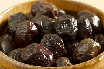 a plate of black olives