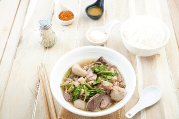 Thai food, boiled beef soup and seasoningsThai food, boiled beef soup and seasoningsv