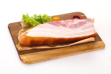 Smoked pork breast with salad leaves
