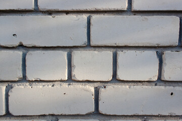 A detailed view of white brick wal