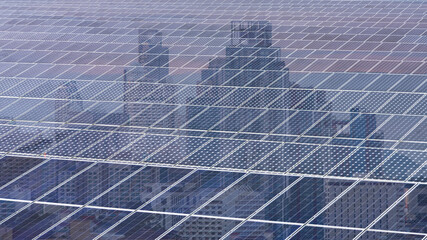 Double exposer Solar panels or photovoltaic with city background to show are power station new alternative electricity source from sun power ecology industry nature ,support city economy. 