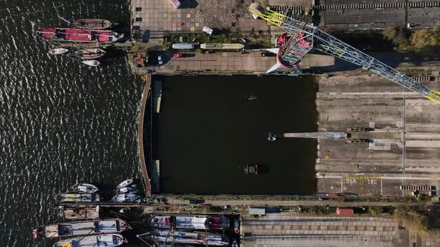 Crane festival ground old historic shipyard in the north of Amsterdam industrial look water robust
