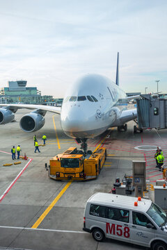 Aircraft push-back with a tug on a airport