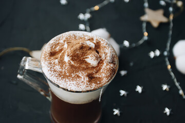 Coffee, cotton, garland and stars on black background. - 393506531