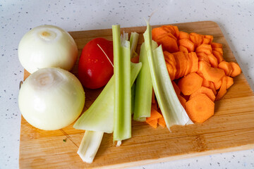 Still life of fresh vegetables on cutting board