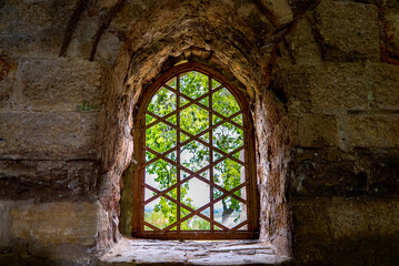 Fototapeta na wymiar Details of beautiful windows in a very old building