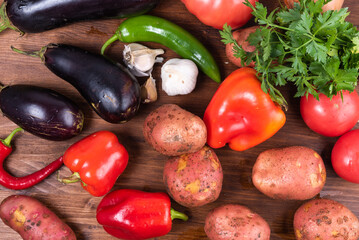 Ingredients for an Italian vegetable stew with potatoes, eggplant and pepper - Cianfotta, ciambotta napoletana.