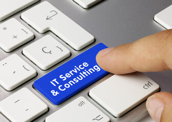 IT Service & Consulting - Inscription on Blue Keyboard Key.