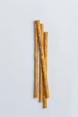Bread sticks on a white background