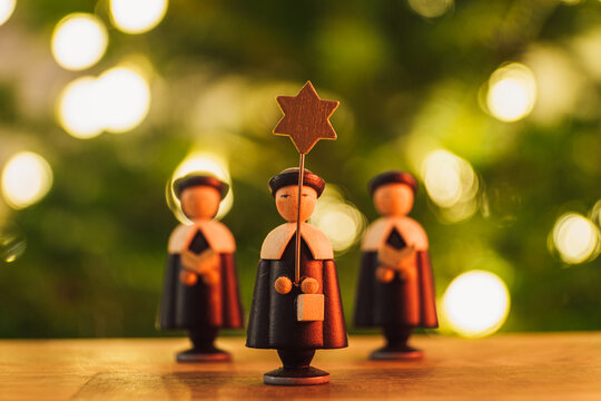 christmas star singers wooden figures closeup
