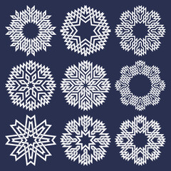Set of eight pointed circular patterns in Oriental intersecting lines style. Nine white mandalas in snowflakes form on blue background.