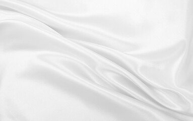 Smooth elegant white silk or satin luxury cloth texture  as wedding background. Luxurious background design