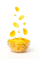 Potato chips in bowl and falling chips