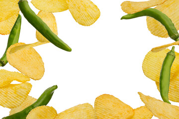 Naklejka premium Potato chips and hot green peppers flying isolated on white