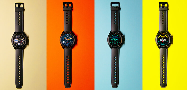 Composition of several smartwatches on different colored backgrounds