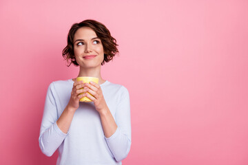 Portrait of pretty girl hold latte mug look copyspace wear sweater isolated over pastel color background