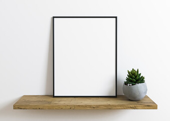 Vertical 8x10 Black Frame mockup. Vertical Black frame on a wooden shelf with plant in a concrete vase. 