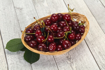 Sweet ripe cherry with leaves