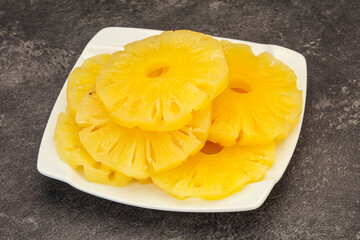 Marinated pineapple rings in the bowl