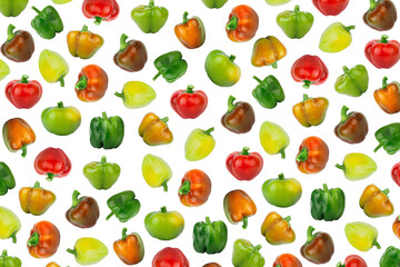 Background from colored raw bell peppers, isolated