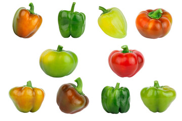 Colored raw bell peppers, white background