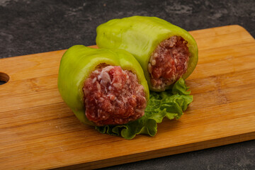 Raw stuffed pepper for cooking
