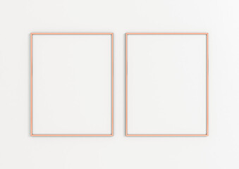 Two Vertical 8x10 Rose Gold Frames Mockup. Double Vertical Rose Gold Frames on a white wall.