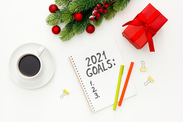 2021 New Year goals and plan with Christmas decorations on white